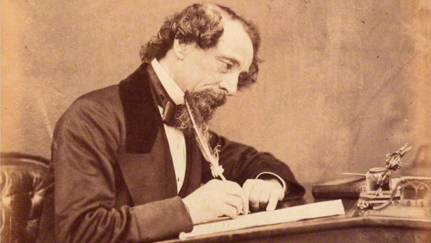 Dickens az íróasztalánál munka közben 1858-ban - forrás: wikipedia