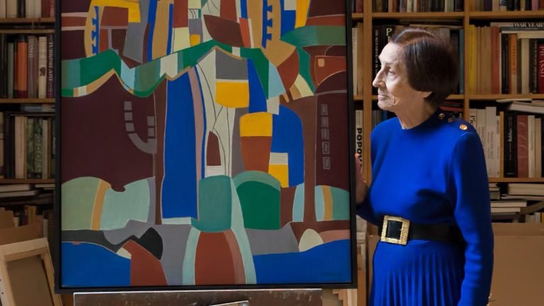 Françoise Gilot with her painting The Cityscape III (Budapest) in her studio in New York, 2017 © Várfok Gallery